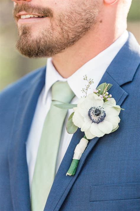 navy suit sage tie.